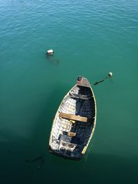 High angle view of boat moored in lake