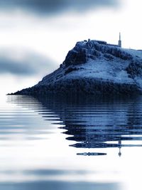 Scenic view of sea against sky during winter