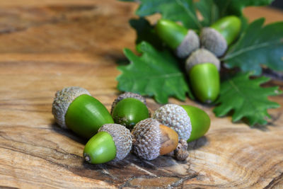 Close-up of green fruits on table