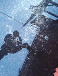 High angle view of puddle on road