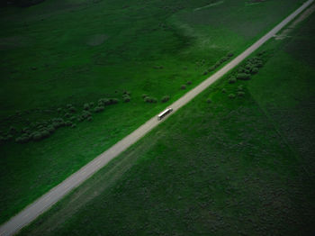 High angle view of road amidst field