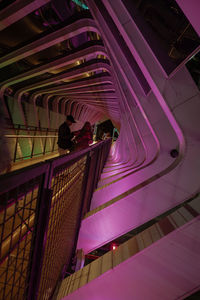 Low angle view of illuminated modern building at night