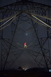 Low angle view of illuminated built structure against sky