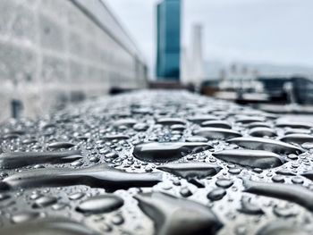 Close-up of wet car on rainy season