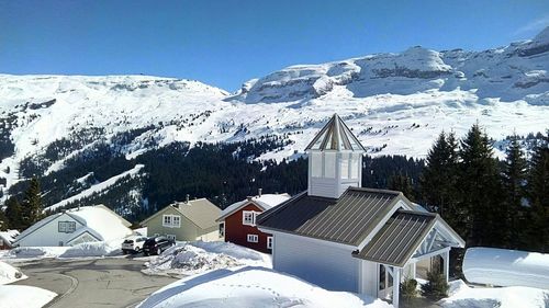 Snow covered mountains against sky