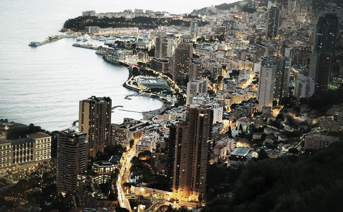 High angle shot of cityscape against the sea