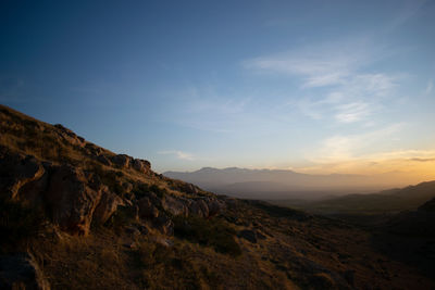 Scenic view of landscape against sky during sunset