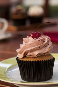 Close-up of cupcakes on table