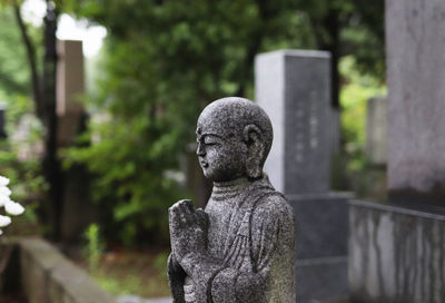 Statue of angel in cemetery