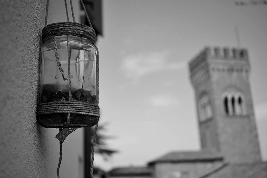 architecture, focus on foreground, built structure, building exterior, day, no people, low angle view, building, outdoors, metal, lighting equipment, close-up, wall - building feature, old, sky, city, history, the past, nature, water