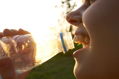 Close-up of woman hand holding drink