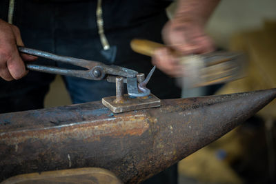 Man working on metal structure