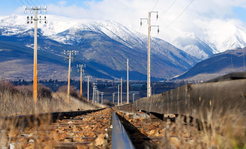 Panoramic view of snowcapped mountains against sky