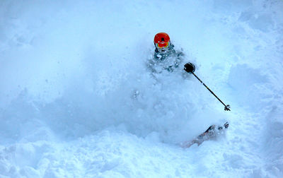 Low angle view of man skiing on ski slope