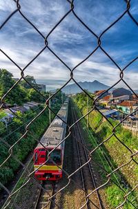 High angle view of train on railroad track against sky