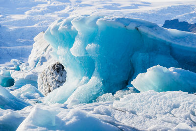 Scenic view of glacier against sky