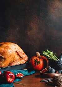 Close-up of roast turkey on table