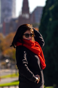 Portrait of woman standing outdoors