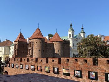 View of buildings against blue sky