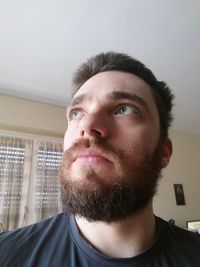 Portrait of mid adult man at home