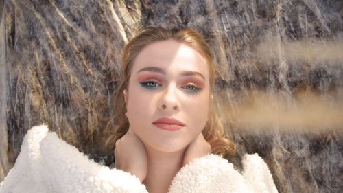 Close-up portrait of teenage girl with make-up