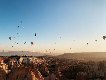View of hot air balloons flying in sky