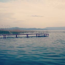 Scenic view of river against sky