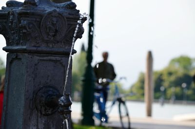 Man riding bicycle on road