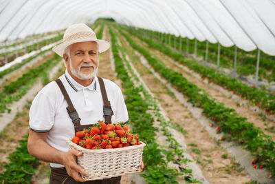 Man holding ice cream in basket