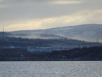 Scenic view of sea against sky during winter
