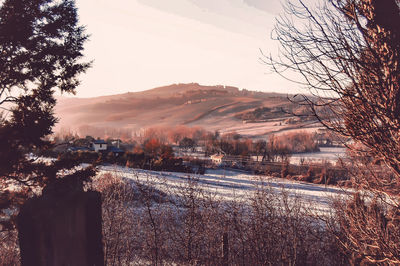 Scenic view of mountains against sky during sunset