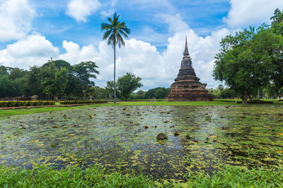 View of temple against cloudy sky
