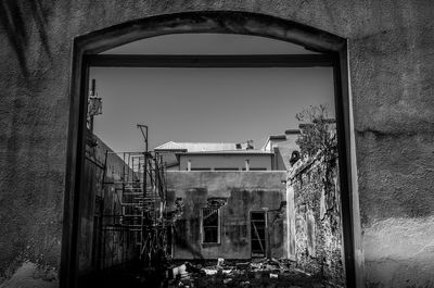 Abandoned building against clear sky