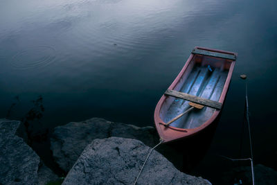 High angle view of boat moored on lake