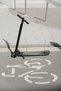 E-scooter parked on bicycle lane in the city