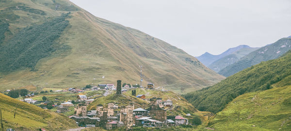 Scenic view of mountains against sky  old village in the mountains, history, towers launch