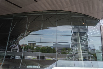 Reflection of buildings on glass window