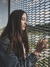 Portrait of beautiful young woman outdoors