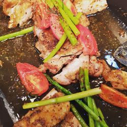 High angle view of mushrooms on barbecue