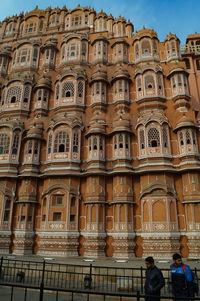 Low angle view of people in historic building