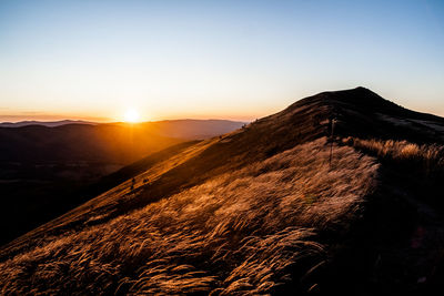 Scenic view of mountains against sky during sunset