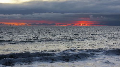 Scenic view of sea against sky during sunset