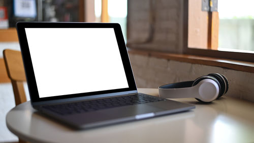 Close-up of laptop on table