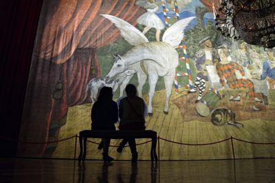 People sitting on floor