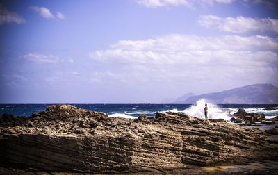 Scenic view of sea against blue sky