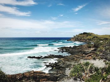 Scenic view of sea against blue sky