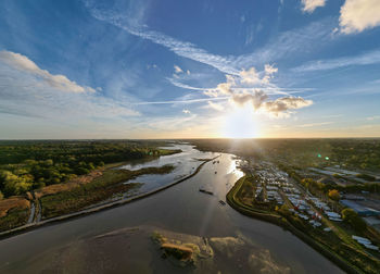An aerial view at sunset over the river deben at melton in suffolk, uk