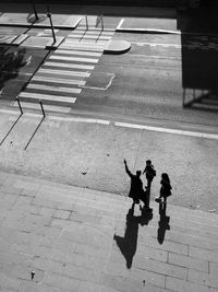 High angle view of man shadow on floor