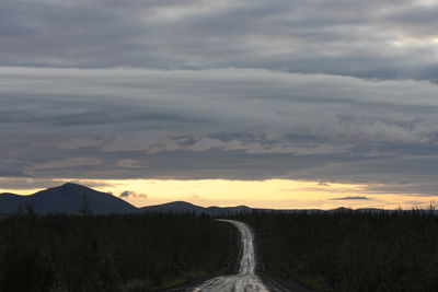 Scenic view of landscape against sky during sunset