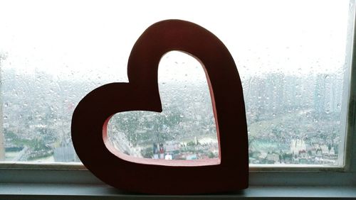 Close-up of wet window in rainy season